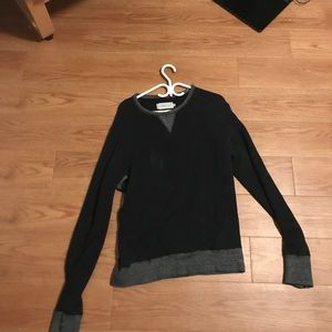 Wings and horns sweater.  Made in Canada.